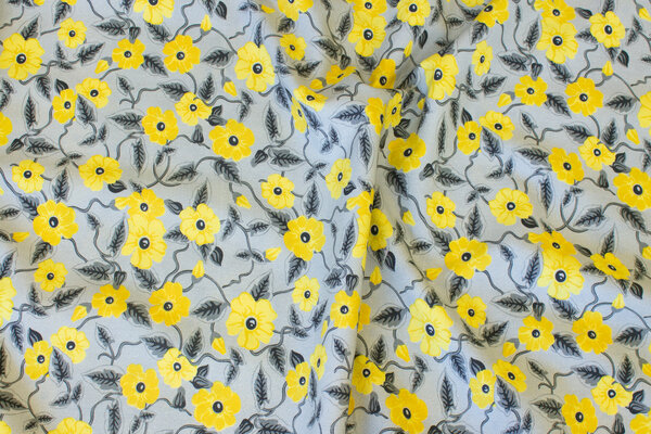 Light cotton in light grey with ca. 2-3 cm yellow flowers