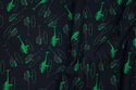 Black, softened sweatshirt fabric with ca. 4 cm green helicopters