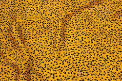 Dark yellow viscose mousselin with black dots