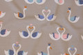 Light grey cotton-jersey with 4 x 5 cm swans