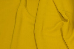 Light viscose crepe in brass-yellow