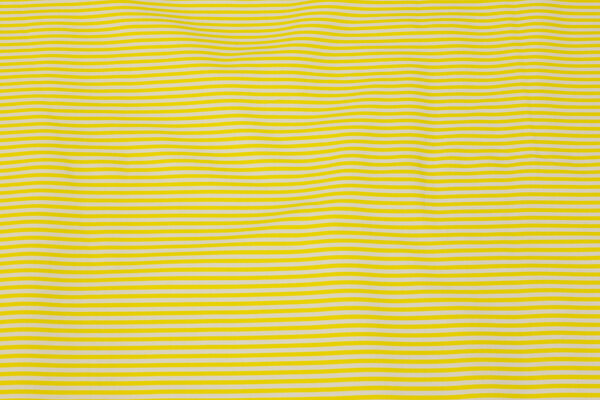 Narrow-striped cotton in lemon-yellow and white
