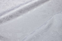 White jacquard-woven polyester satin with paisley-pattern