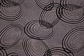 Light polyester mousselin with black circle-pattern