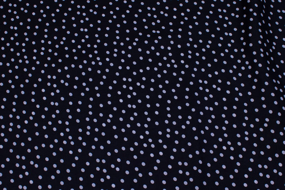 Polyester mousselin in black with white dot 