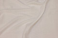 Thin, white cotton-batist with small flock-dot