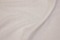 Thin, white cotton-batist with small flock-dot