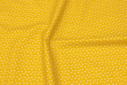 Brass-yellow cotton with small white flower