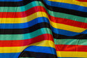 Carneval satin with ca. 15 mm wide stripes along length