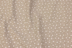 Double woven cotton (gauze) in light sand with small flowers