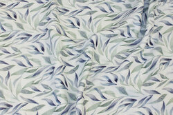 Double-woven cotton (gauze) in white with blue-green leaves