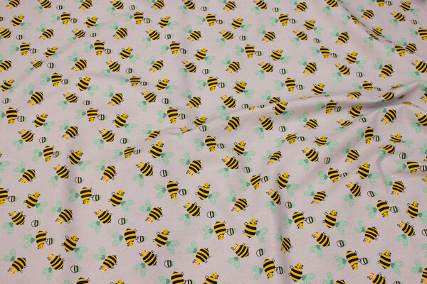 Light grey cotton with ca. 2 cm bees
