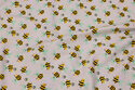 Light grey cotton with ca. 2 cm bees
