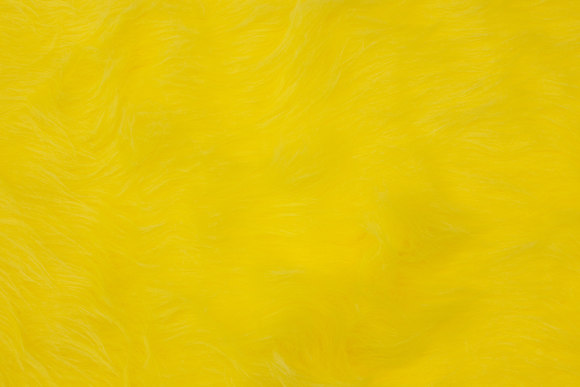 Long-haired fake fur in lemon-yellow