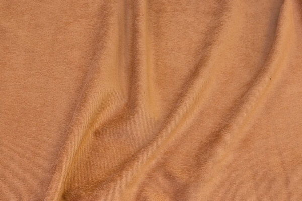 Narrow-corded cinnamon-colored baby corduroy in polyester with light stretch