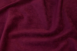 Narrow-corded red-purple baby corduroy in polyester with light stretch