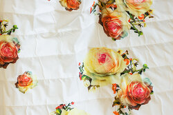 Off white double-sided quilt with roses