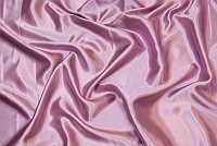 Polyester sateen in light dusty reddish purple
