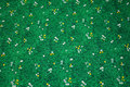Green patchwork-cotton with grass, small daisies