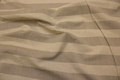 Linen-colored polyester and linen with 5 cm wide across-stripes