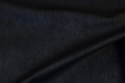 Soft, black faux hide with light surface-textured surface