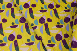 Double-sided cotton-quilt in lime-yellow and purple