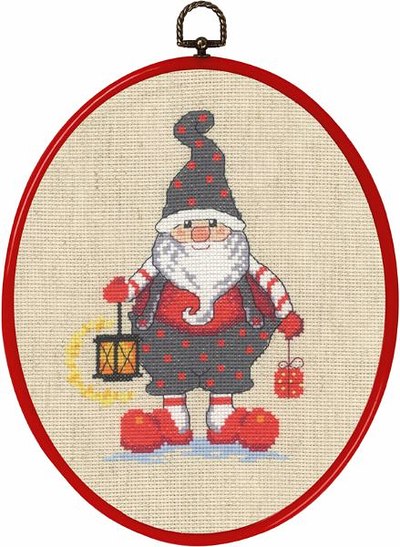 Wall embroidery with elf with lamp
