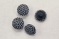 Dot buttons in black and white