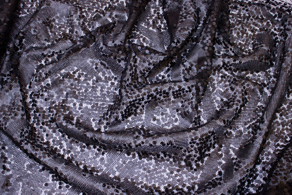 Matte-black sewn-on sequins on tulle base