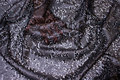 Matte-black sewn-on sequins on tulle base