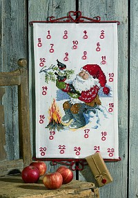 White christmas gift calendar with Santa by the fire. Permin 34-9250. 