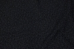 Black patchwork cotton with discrete leaf-pattern
