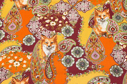 Firm cotton in golden colors with ca. 6 cm foxes