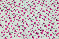 Mint-green cotton with ca. 1 cm red-purple flowers