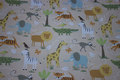 Beige, gots organic woven cotton with African animals