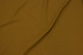Okkerfarvet, soft 2-way stretch for dresses, skirts and light pants