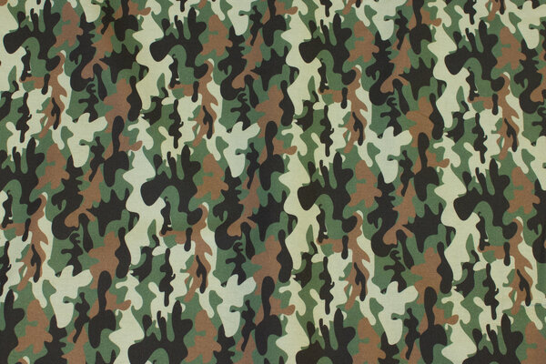 Light cotton with camouflage-pattern in green and brown nuances