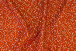 Rust-colored cotton with white line-pattern