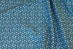 Dark green cotton with small white pattern