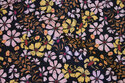 Soft, black cotton with soft red and yellow flowers