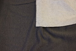Speckled, dark grey sweatshirt fabric with light, softened back