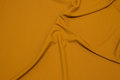 Lightweight dress-strækcrepe in brass-yellow