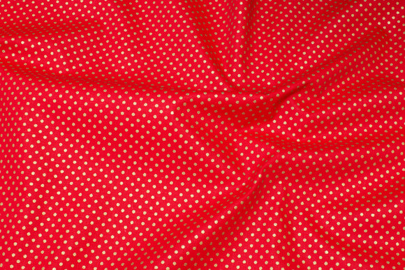 Rugged red deko-cotton with small gold-dots