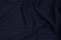 Navy needles-stripes in heavy jersey with slightly ruffled surface