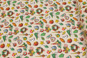 Creme-color cotton with ca. 2-3 cm christmas motifs