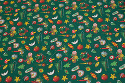 Green cotton with ca. 2-3 cm christmas motifs