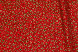 Red christmas-cotton with small holly leaves