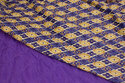 Soft quilt with purple foerbagside
