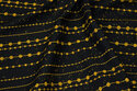 Black cotton with golden chain-pattern