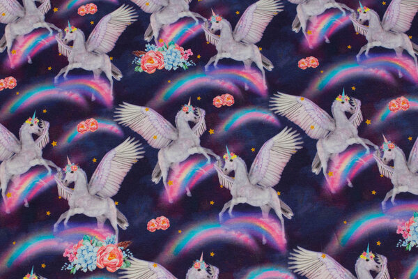 Dark red-purple cotton-jersey with flying unicorns and rainbows